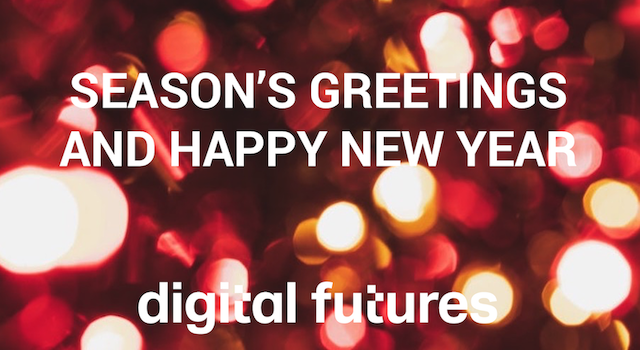 Blurred red and yellow holiday lights with white text that reads, “Season’s Greetings and Happy New Year digital futures.”.