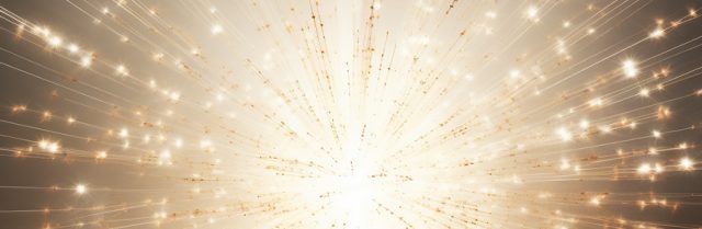 A burst of bright, golden-white light with radiating beams and glowing particles on a dark background, resembling an explosion or a starburst effect.